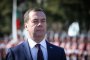 Руският премиер се смял след посещението в самолета 