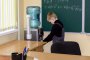    С бидони в клас