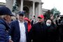  Сърджан Джокович (с бялата риза) по време на протеста