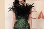 Деми Мур помага на Gucci на Оскарите